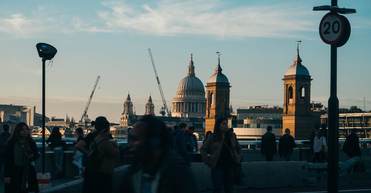 Busy city street with St. Paul's Cathedral at golden sunset, perfect for cheap city breaks