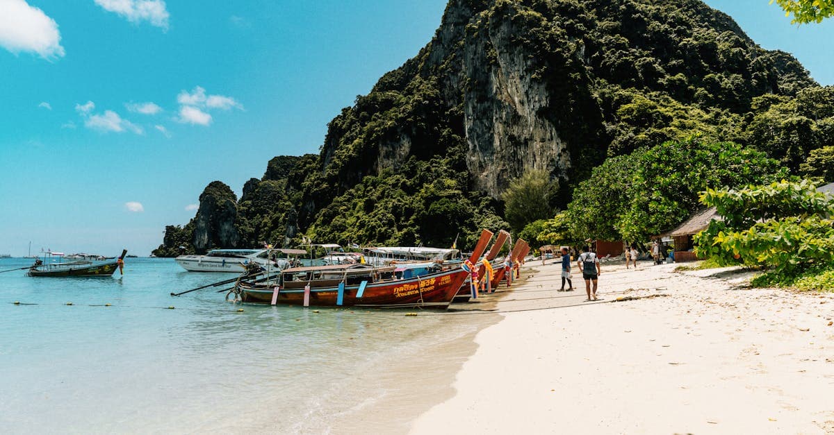 Ko Panyi floating village and traditional boats in Phang Nga, highlighting Thailand's three distinct travel seasons