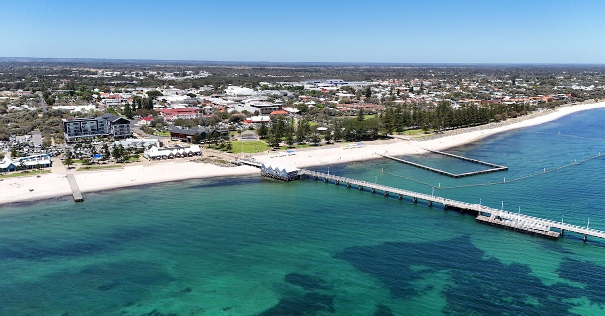 Stunning aerial view of Busselton Jetty and coastline in Western Australia. Perfect vacation destination.
