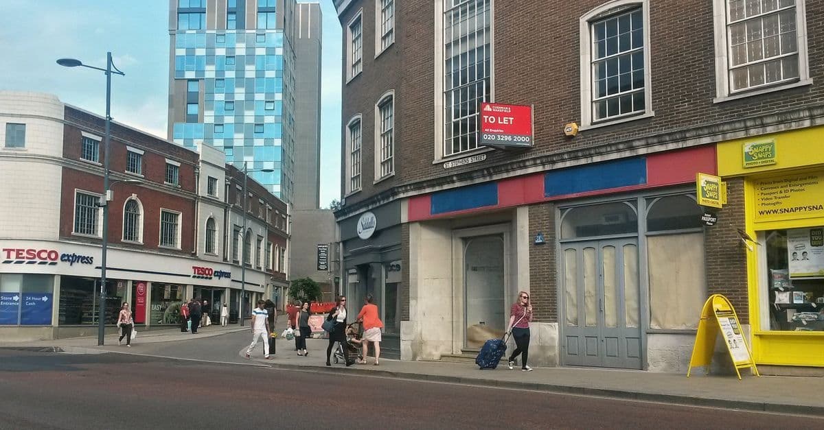 Busy Norwich high street where a Tesco pay as you go SIM keeps travellers connected on the go