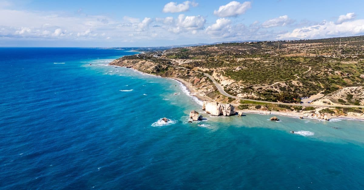 Aphrodite's Rock rising from vibrant blue waters along the scenic coastline of cyprus the country