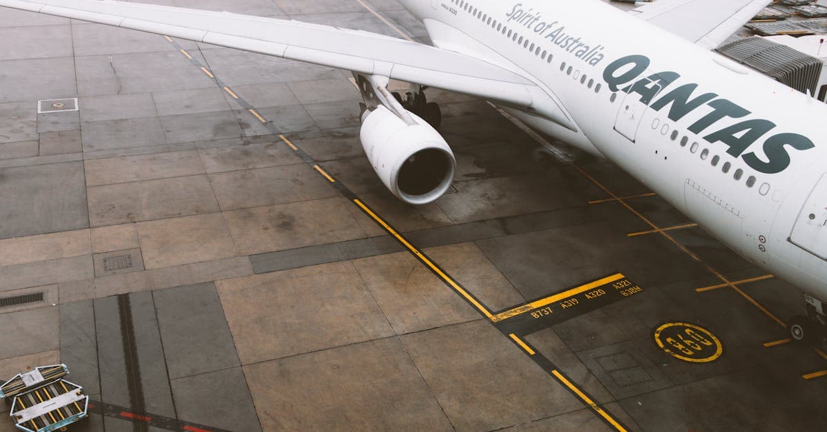 Qantas commercial aircraft parked on the tarmac at Melbourne Airport, Australia
