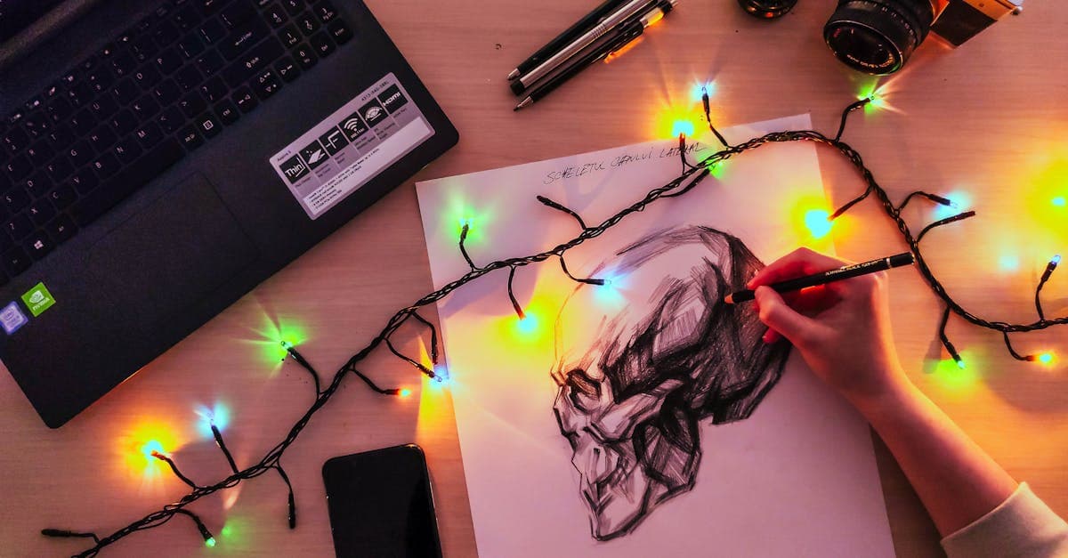 Detailed skull sketch in a creative workspace with fairy lights and drawing tools for artistic inspiration