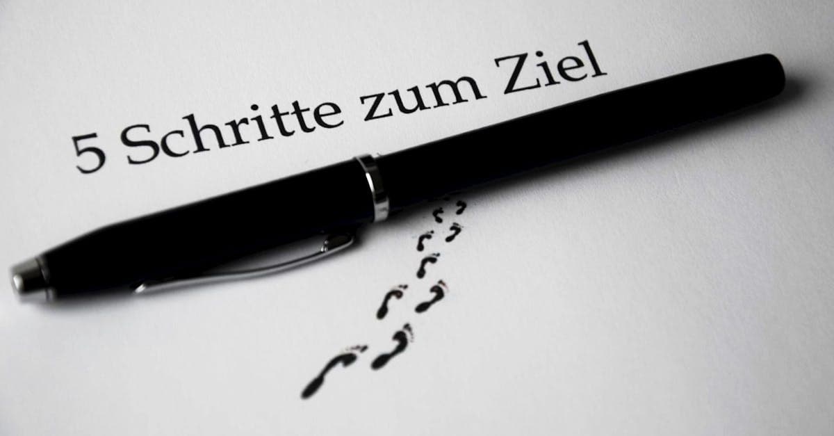 A black pen on a paper with text and footprint visual elements for a conceptual theme.