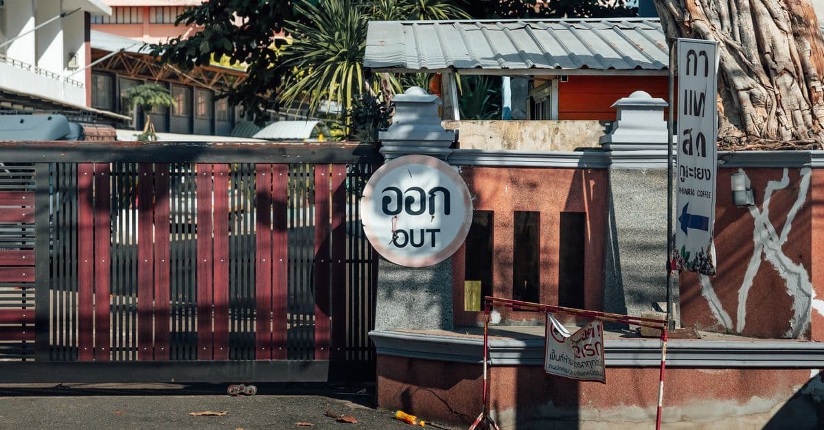 Chiang Mai street scene with bilingual Thai and English signage, helpful for staying connected while traveling Thailand.