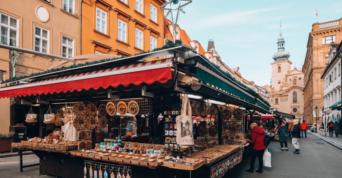Colourful souvenir stall at a traditional European Christmas market in Austria, France, or the Czech Republic.