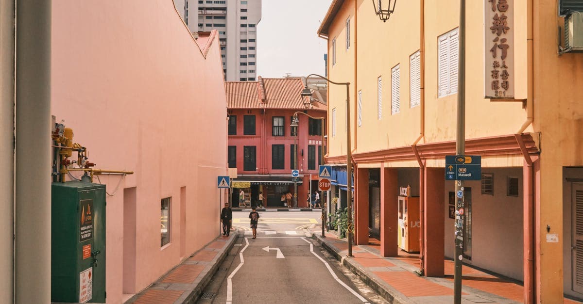 Vibrant shophouse facades lining a Chinatown street, a must-add neighborhood for any Singapore itinerary
