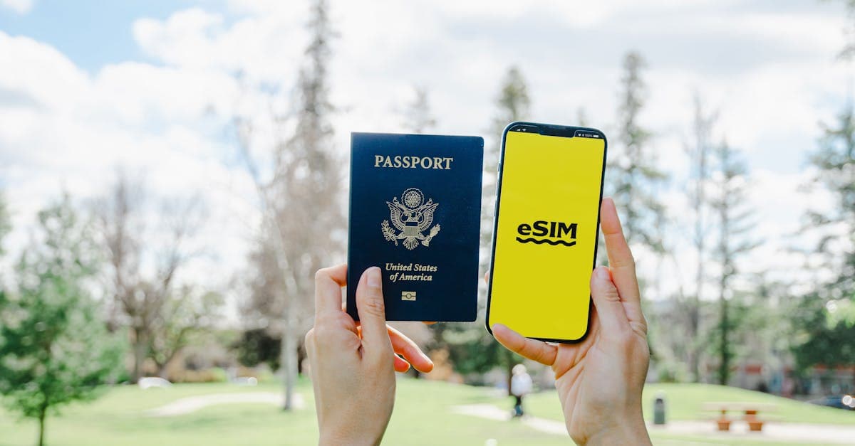 Holding a passport and smartphone with a travel eSIM app for seamless mobile connectivity while visiting Bali![image