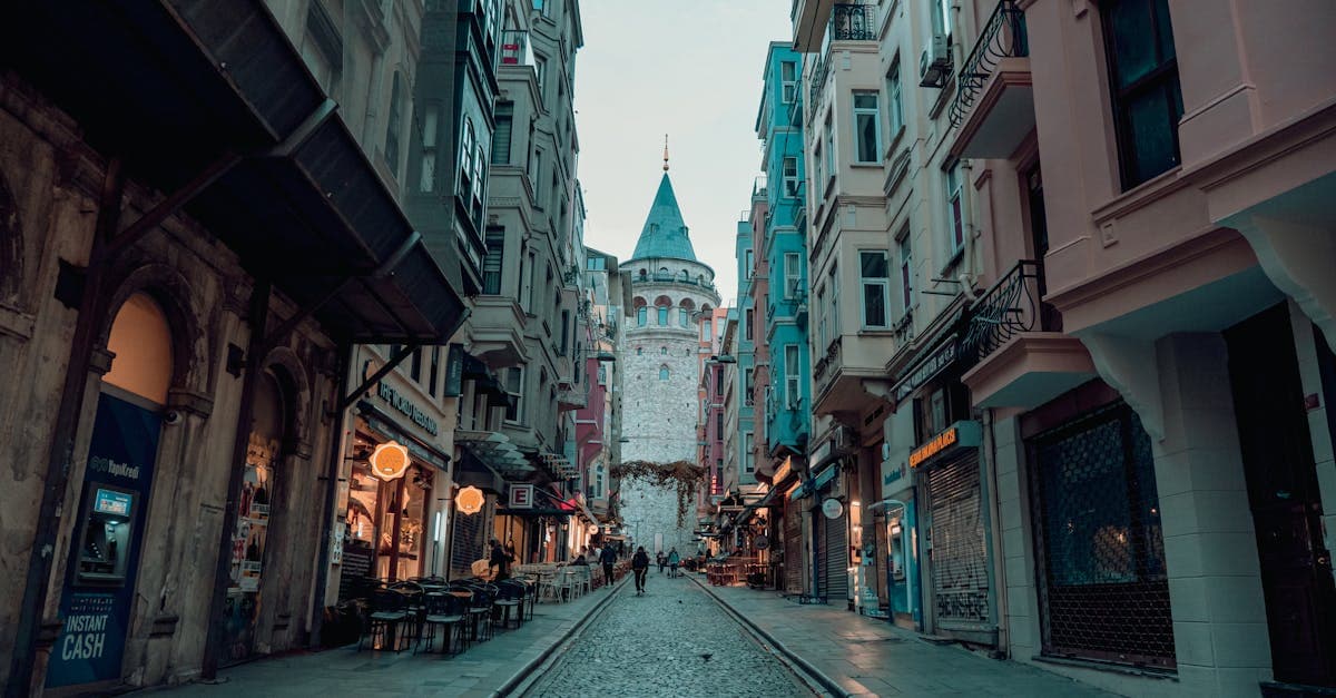 Busy street leading to Galata Tower in Istanbul, where petty crime awareness is key for safe travel to Turkey