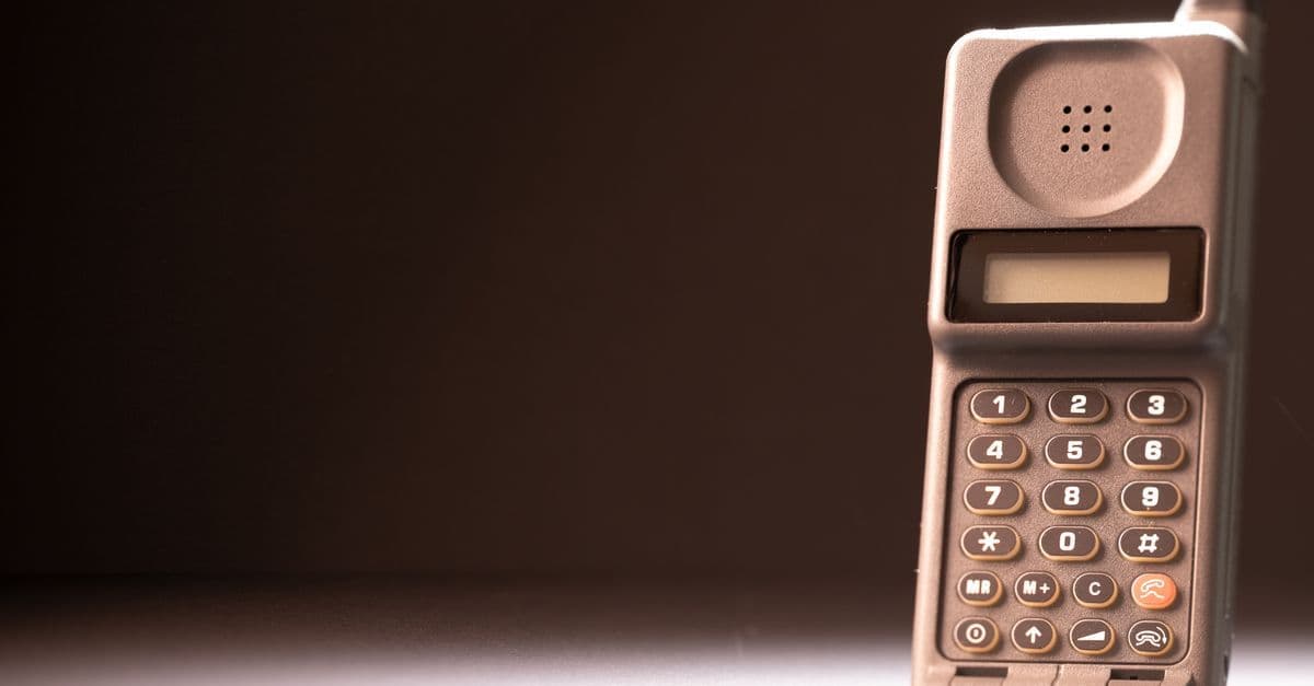 Motorola Razr 60 Ultra flip phone open on a dark background, highlighting its sleek, modern design.