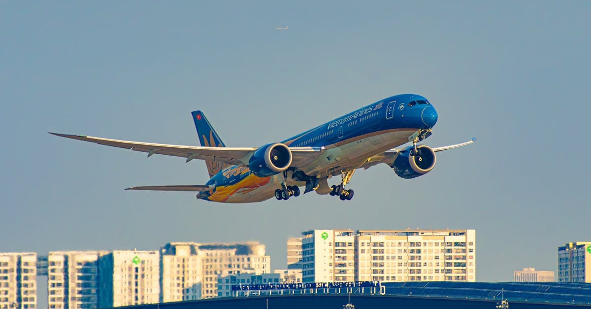 Vietnam Airlines plane taking off from Ho Chi Minh City airport, giving Australians context for eVisa approval timing.