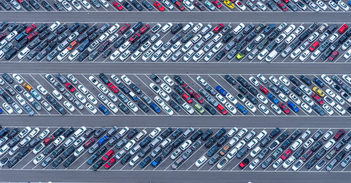 High-angle aerial photo showcasing a crowded parking lot filled with diverse vehicles in Florida.