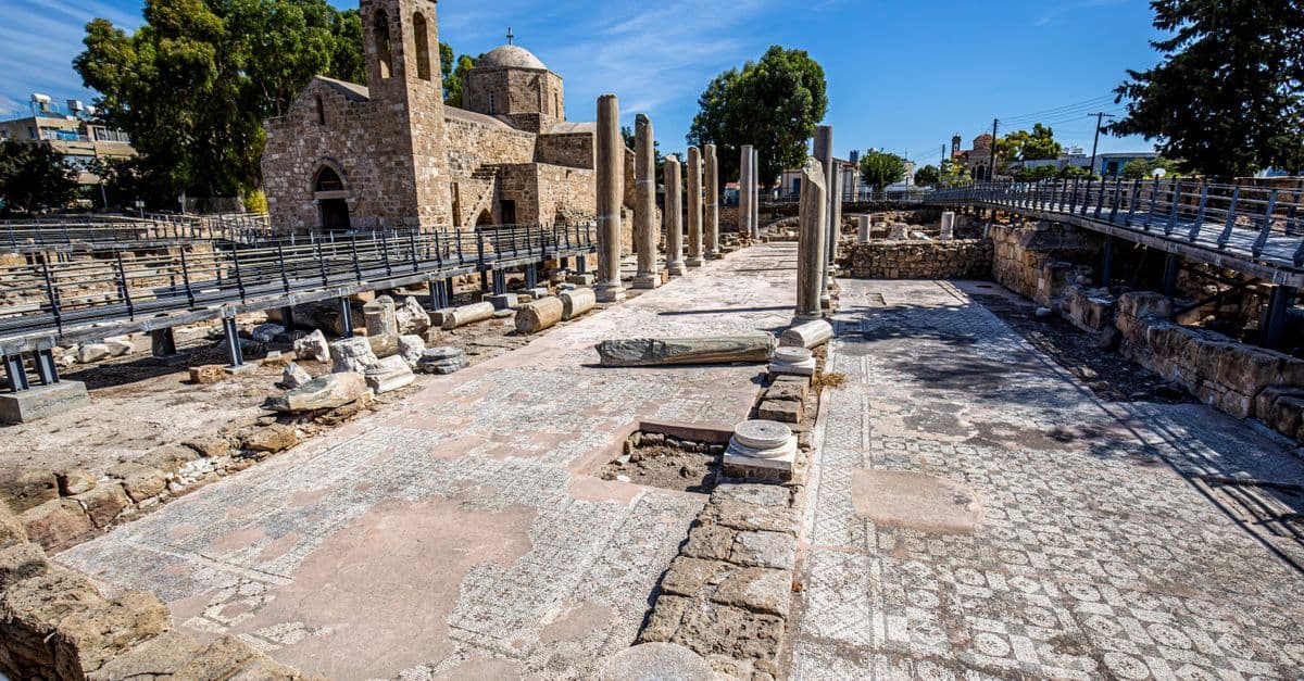 Ancient Roman columns beside Agia Kyriaki Chrysopolitissa Church at the UNESCO archaeological site in Paphos