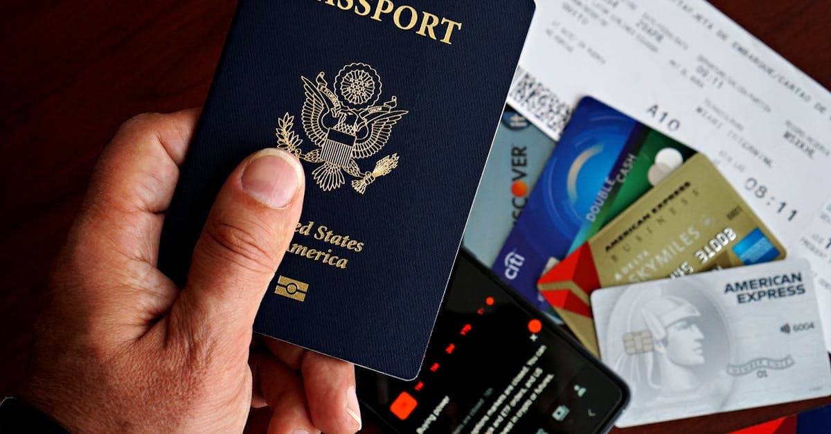 US passport, credit cards and travel documents laid out for travel insurance for America planning