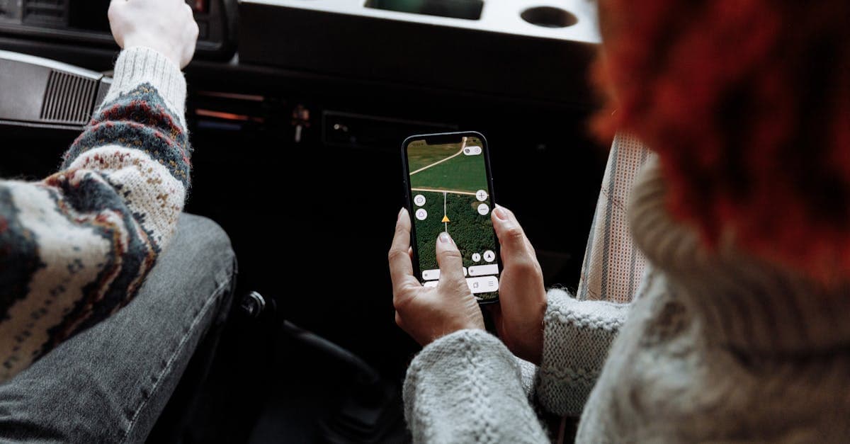 Two travellers using a navigation app on a smartphone, illustrating hello roam vs travel eSIM app ease of use.
