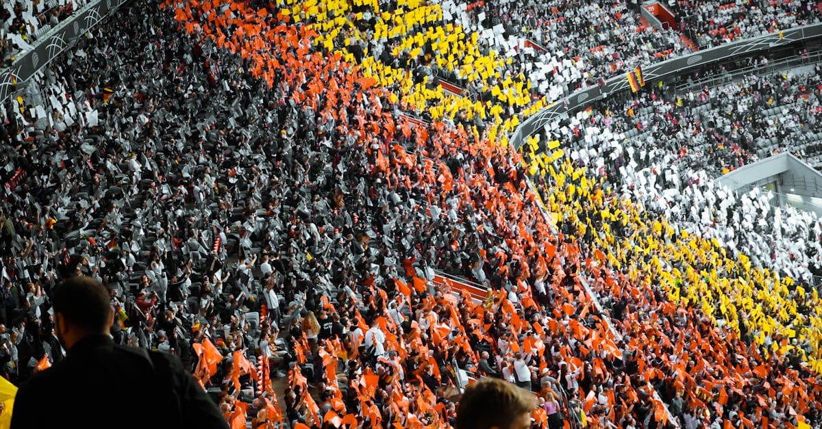 Farbenfrohe Fanblöcke im Münchner Stadion zeigen Deutschlands Gruppenphase bei der WM 2026