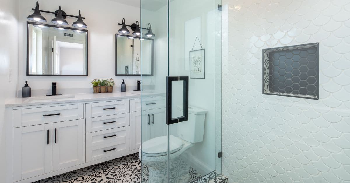 Clean, modern shower facility with glass enclosure and tiled floor at a TA travel center.