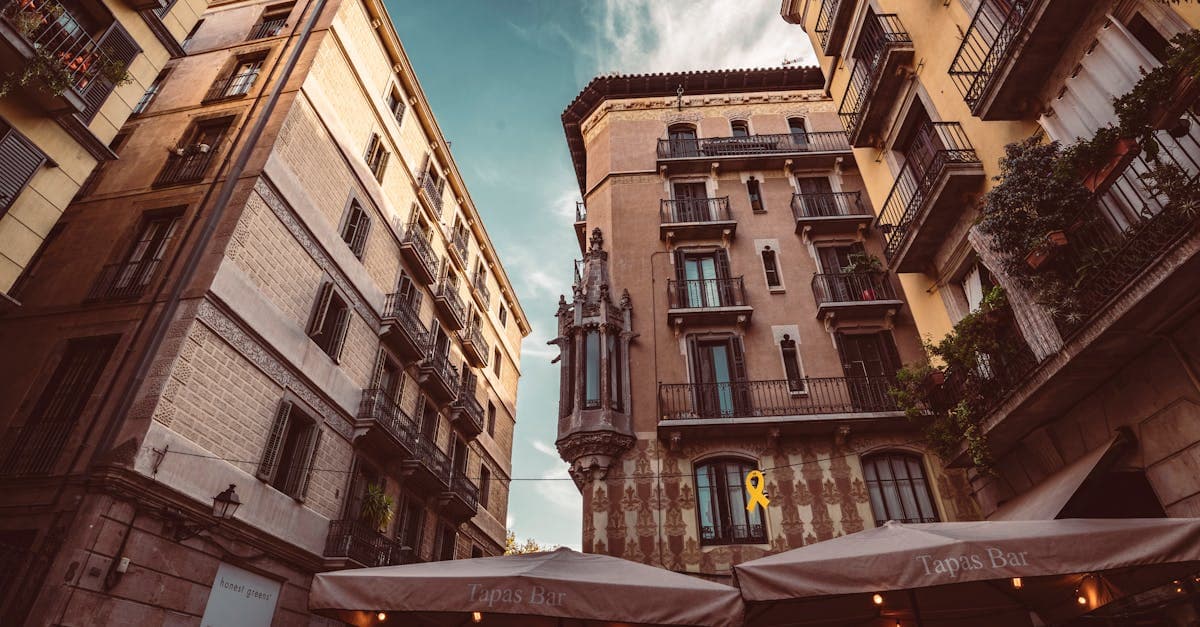 Charming Barcelona street with ornate balconies where you can activate your esim spain on iPhone or Android