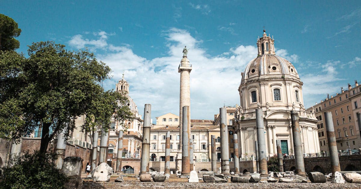 Ancient Roman columns and historic buildings under clear skies, answering your things to do in Rome questions