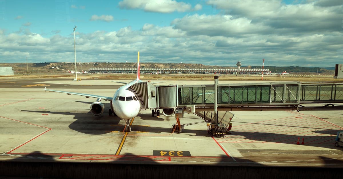 Commercial aircraft docked at a departure gate, ready for direct flights to Ibiza.