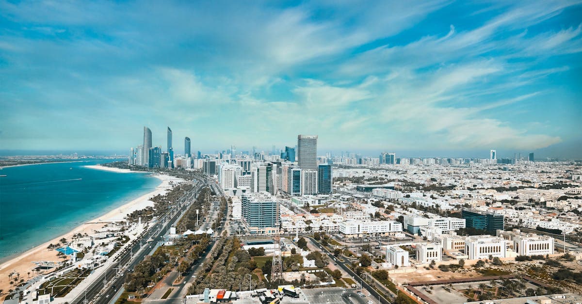Abu Dhabi's gleaming waterfront skyline, a major connecting hub for toronto to delhi flights via Etihad