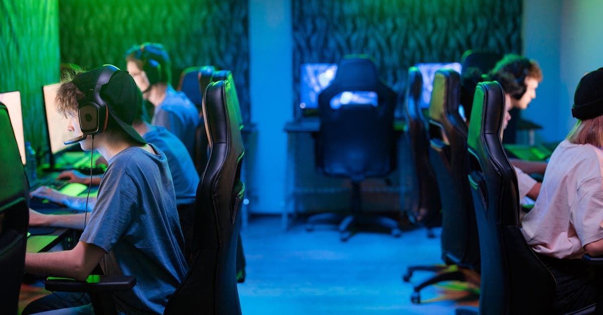 Focused esports team immersed in intense gameplay at a thriving internet cafe around the world.