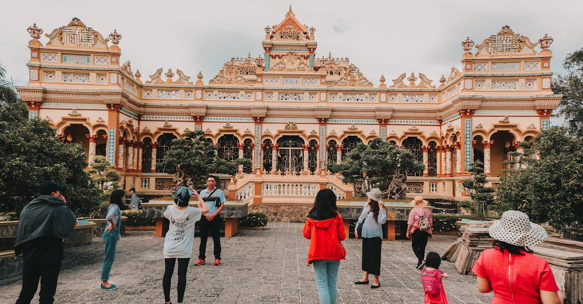 Tourists at Vinh Trang Temple, a destination accessible after completing the vietnam visa for australian eVisa application.
