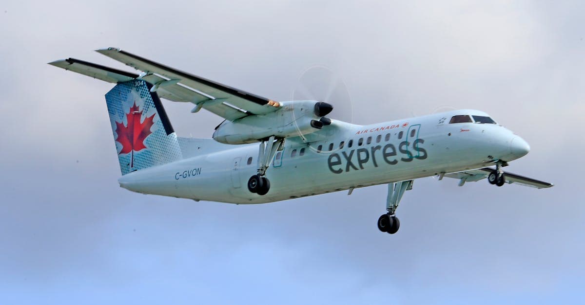Air Canada Express aircraft in flight, one of several airlines serving toronto to delhi flights