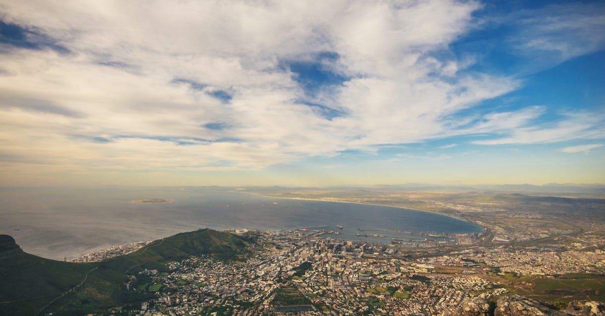 Aerial view of Cape Town coastline and mountains, covered by best travel insurance south africa policies