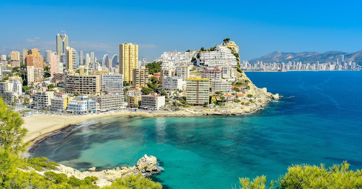 Turquoise Mediterranean waters and modern high-rise towers make Benidorm holidays a sought-after destination on Spain's Costa Blanca.