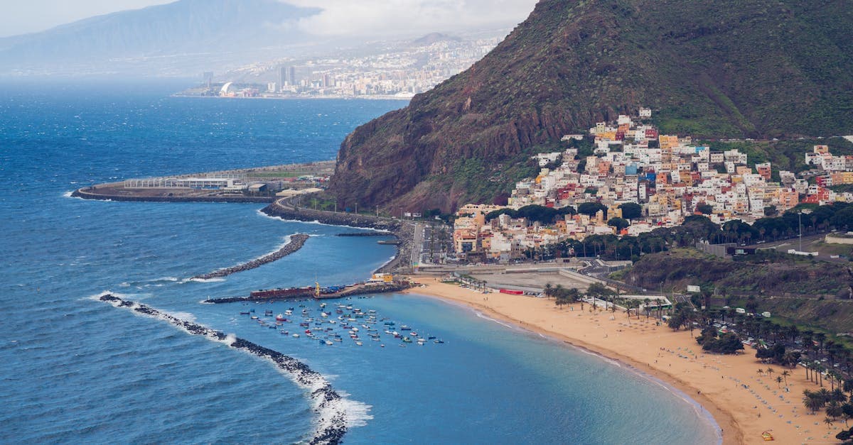 Playa de las Teresitas with turquoise ocean and mountains, showing the best time to visit Tenerife for your trip