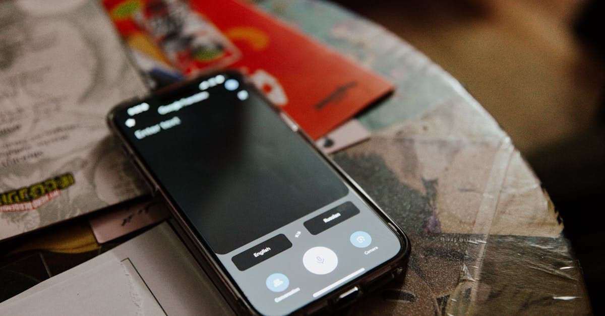 Smartphone on cluttered desk with notes for a quick Siri not working troubleshooting overview