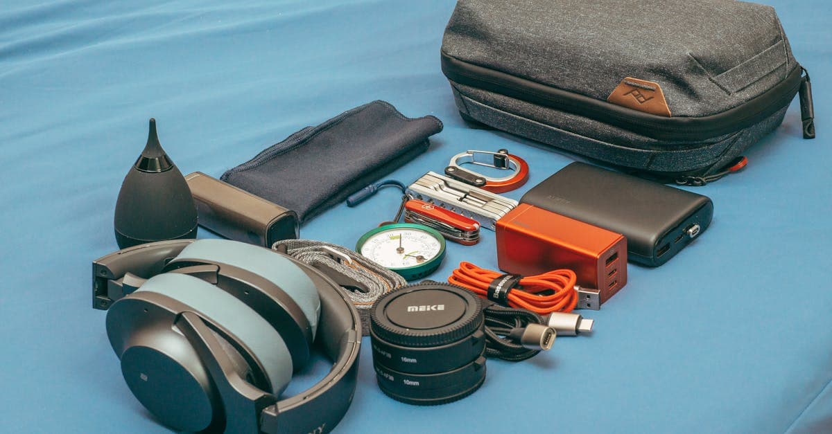 Flat lay of travel health essentials, compass, and accessories every Singapore packing list should include