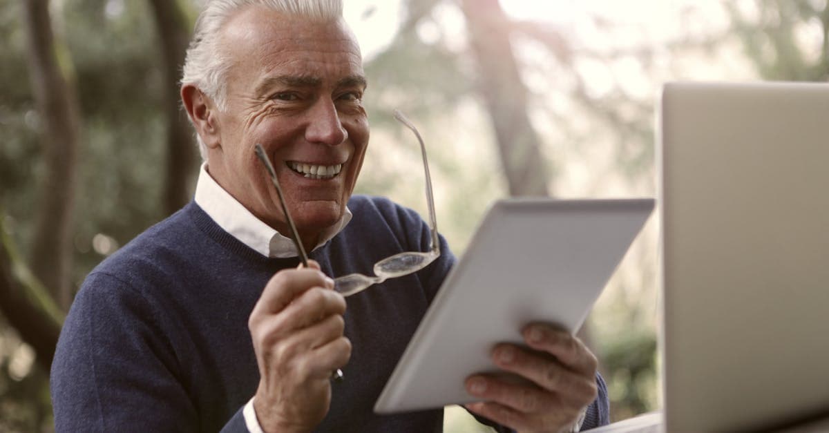 Experienced professional on tablet outdoors considering Singapore digital travel eSIM visa pathways like ONE Pass