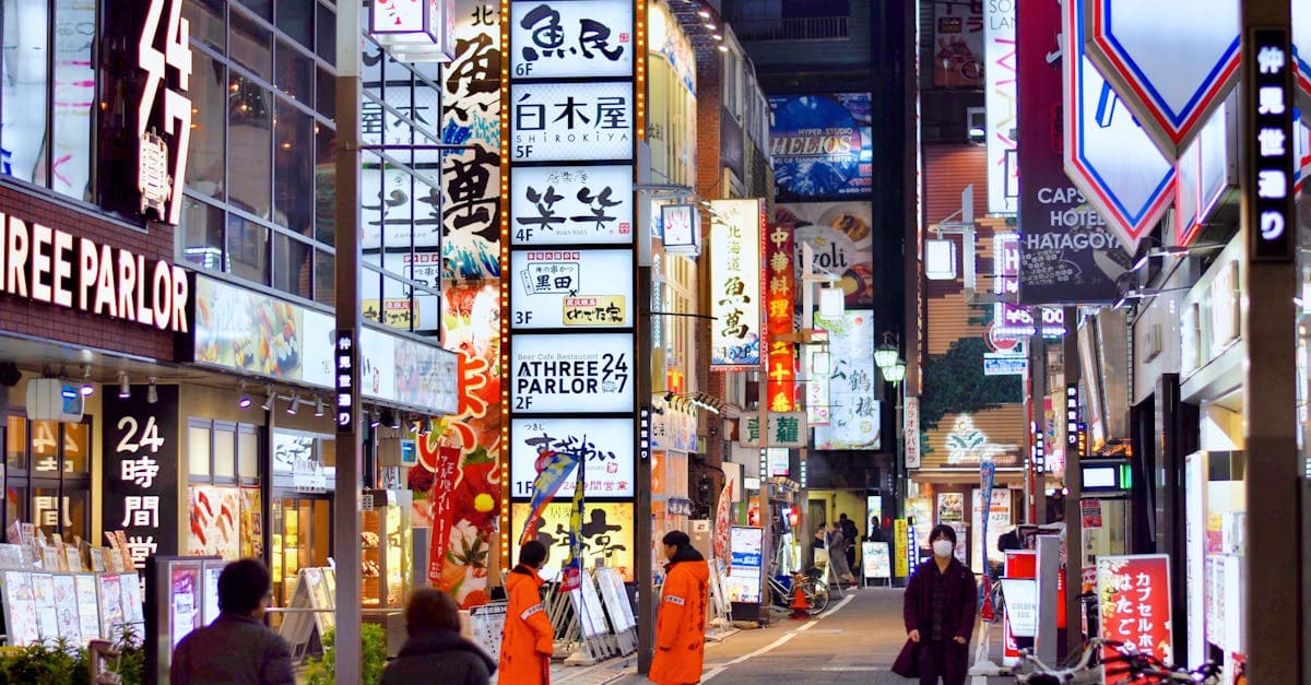 Busy neon-lit Tokyo streets at night, a guide to what not to do as a tourist in the city