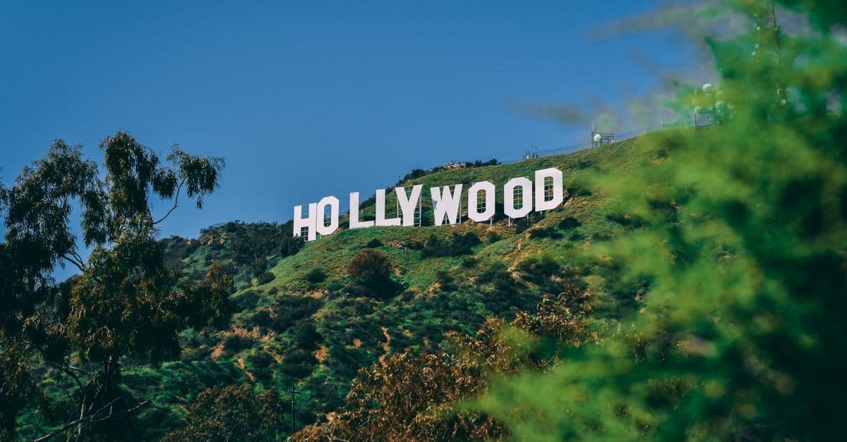 Sunny Hollywood sign overlooking Los Angeles as visitors prepare for the olympics 2028 los angeles ticket rush.