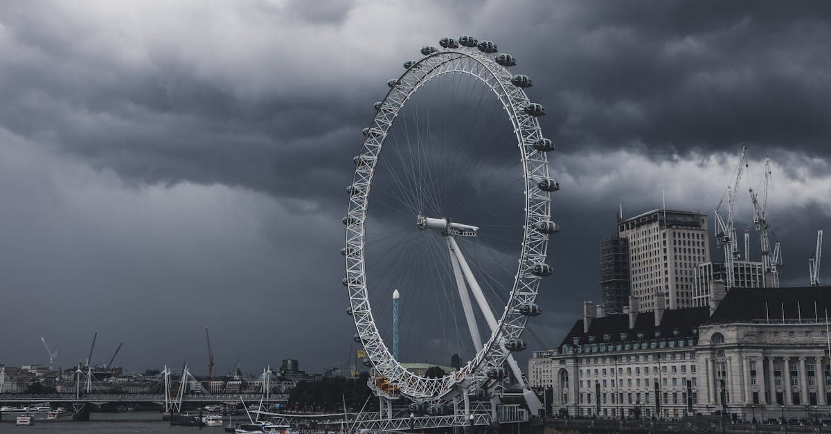Tower Bridge spanning the River Thames on a typical london weather day, showcasing its majestic Gothic architecture